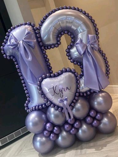 Luxury Double Balloon Stack Purple and silver balloon arrangement featuring the number 13 and a heart with "Kyra" written on it.