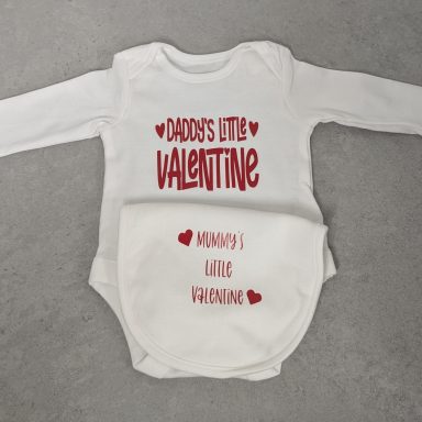 Baby Vest & bib set White baby bodysuit reading "Daddy's Little Valentine" with an attached bib that says "Mummy's Little Valentine."